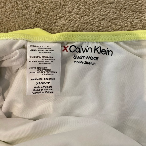 Calvin Klein, One piece swimsuit. 

￼ - Picture 2 of 4